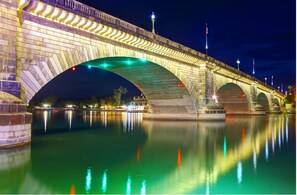 As twilight descends, London Bridge in Lake Havasu becomes a silhouette adorned with twinkling lights. A blend of history and modern charm of this iconic bridge.