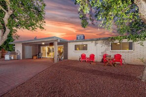 Home offers lovely outdoor living with covered back patio, fenced yard, and golf course views