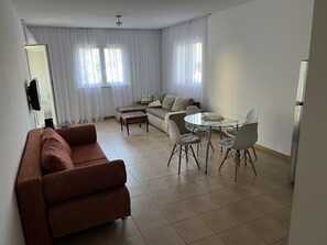 The living area with modern furniture