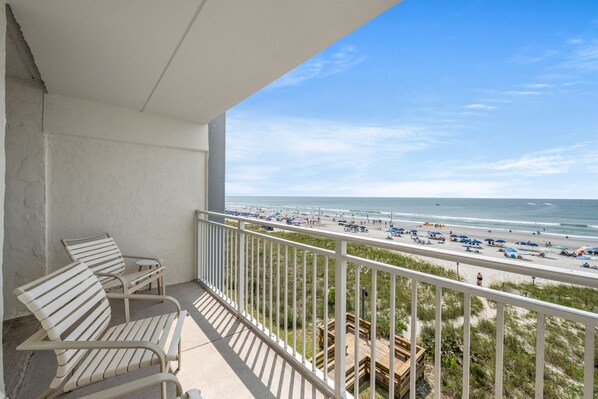 Sit down with a cup of coffee while watching the waves.