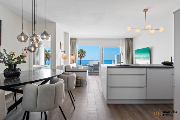 Living room with open kitchen island.