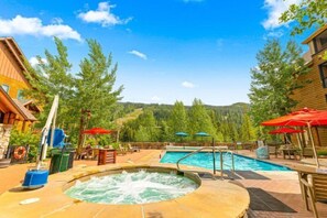 Dive into relaxation 💦 Access five community hot tubs and a refreshing pool. Open Summer & Winter! ❄️☀️