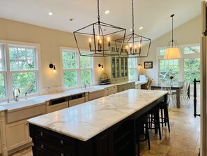 Chef's kitchen with double sinks and dishwashers