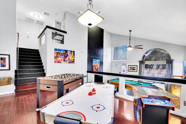 Enjoy a game of air hockey, foosball, or play a game on the arcade machine!
