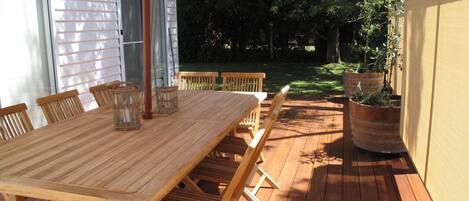 Serenity Now has a large deck with a teak table that seats 10 people.