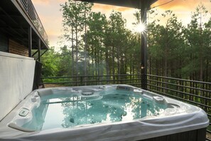 Just off the game room and next to the Manana Bar is a large hot tub with LED lighting.