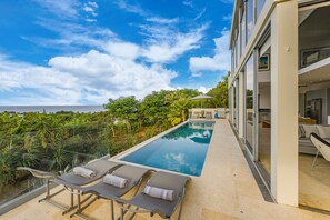 Pool with loungers and fabulous views of the Barbados West Coast