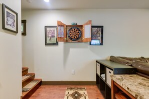 Living Area | Dartboard | DVD Player | Queen Sleeper Sofa | Central Air Conditioning