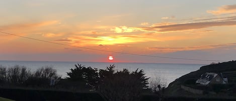 Vue couché de soleil depuis la maison