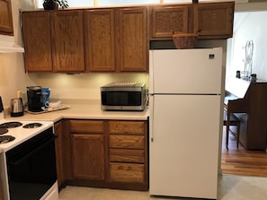 Kitchen: coffee supplies, microwave & refridgerator.