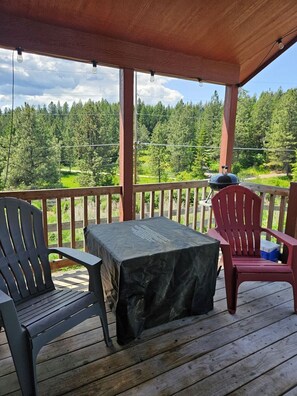 Front porch- Propane fire pit.
