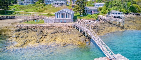 Aerial view of house and private dock