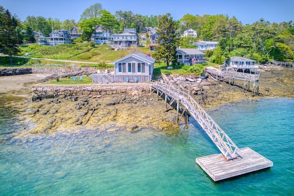 Aerial view of house and private dock