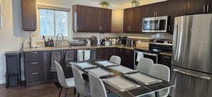 Fully stocked kitchen and dining table