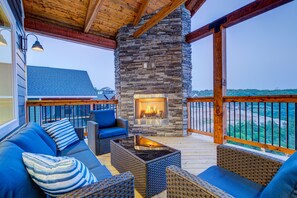 Cozy up to the outdoor gas fireplace to share a story or a drink