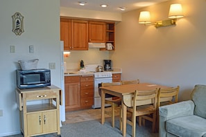 There is a fully-stocked kitchen in each unit, ready for you to stay in & cook!