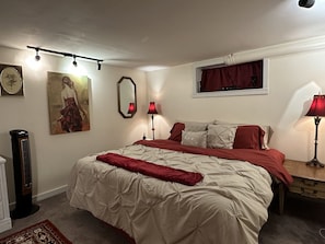 King bed with soft, fresh bedding. Black out curtains to help you sleep in.
