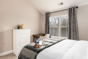 Plenty of dresser space to make yourself at home and a nice desk + office chair with nature view...