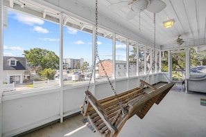Enjoy your coffee, a book, or conversation while you swing life way with peek a boo views of the ocean in the foreground.