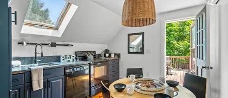 Cozy eat-in kitchen with skylight