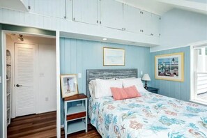 This bedroom is just across the hall from the full bathroom