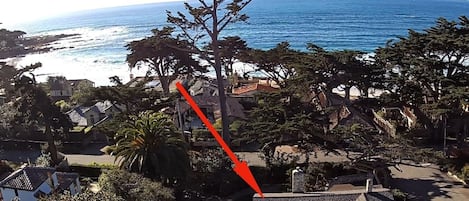 Ariel view showing how close the house is to the beach
