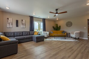 Gray couch pulls out into a full size bed.
Yellow couch folds down into a twin 