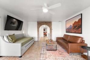 The living room area with plenty of seating for your loved ones