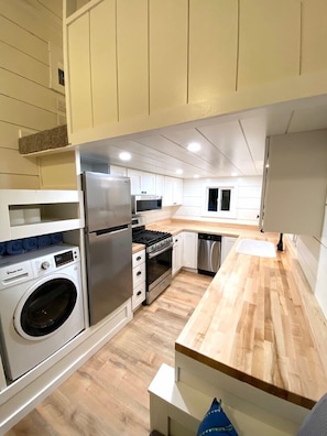 Take out or home cooked meal? A full kitchen makes cooking easy! Dirty clothes from fun on the dunes? this home has a washer for your convenience.