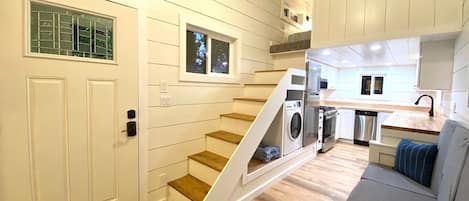 Tiny homes are the future! This beautiful "tiny" home is comfy and inviting with its modern farmhouse style. Feel home while away from home with everything you will need for your adventurous s