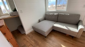 Cozy corner with a couch, perfect for relaxing together.