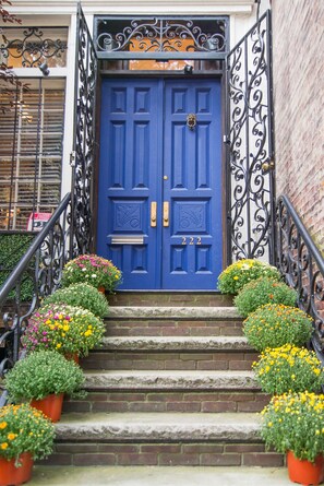 Open the gates on east 83rd street to the front steps of your TOWNHOUSE