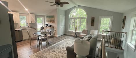 Open space to enjoy all the views of the tree lined backyard.