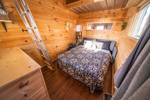 Two bedrooms with separate entrances, each with a queen sofa bed and lofted twin