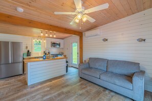 Living space leading into kitchen. 