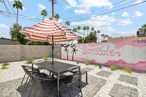 Escape the hustle of the day in the back yard oasis!