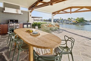 Relax in the spacious outdoor patio overlooking the canal
