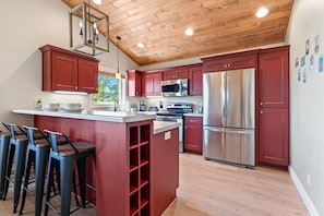 Modern kitchen with bar seating for 4