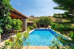 Private pool, terrace, and garden