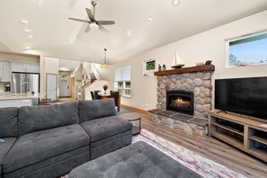 living room1 - Comfortable living area with cable TV, streaming,  Gas Fireplace and access to patio with outdoor seating and Gas BBQ.