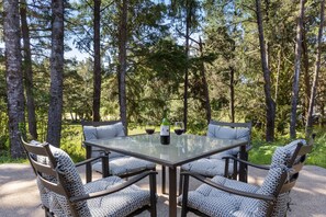 Outdoor patio with Gas BBQ, Patio seating, and a view of the 6th hole on the Golf Course.