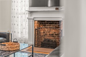 Cozy family room with fireplace and smart tv.