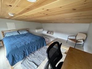 Queen bed, workstation, meditation chair, and hammock with book nook