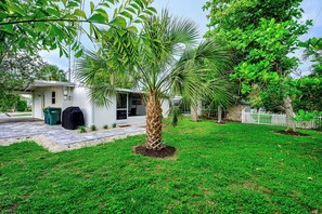 Backyard with pavers to lanai
Not fully fenced