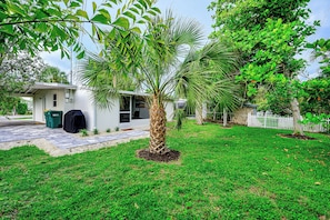 Backyard with pavers to lanai
Not fully fenced