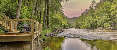 Run to the river and take in the beautiful view from the large riverside deck...