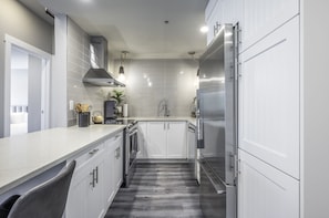 Provisioned kitchen for all your cooking needs.