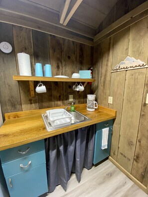 Kitchenette to your right as you enter the cabin