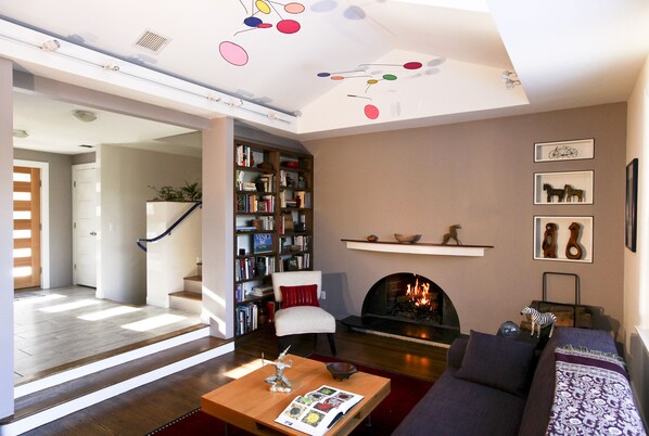 skylit living room with huge picture window (not shown in image).