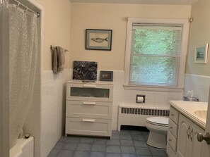 full bath with tub